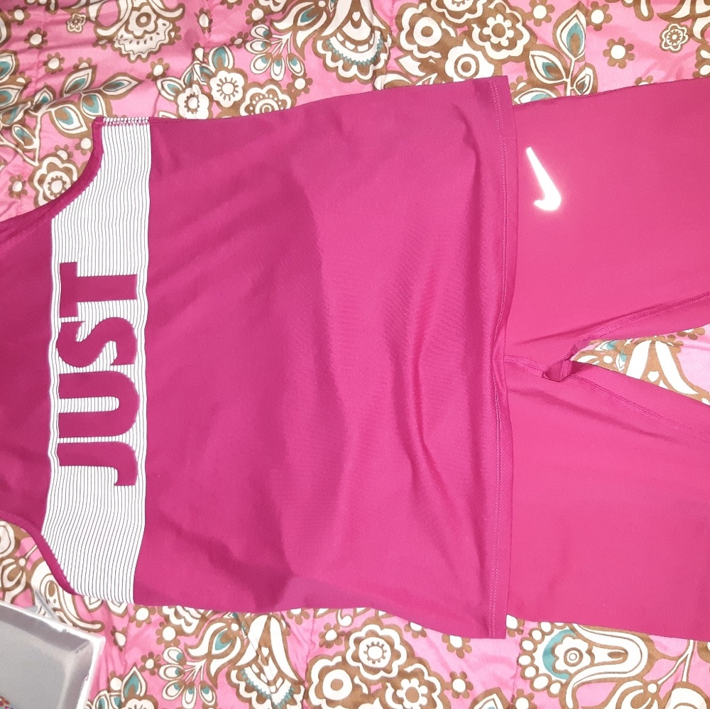 Nike gym suit. Top is medium bottoms are large